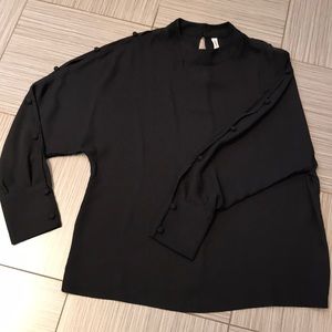 Blouse with button sleeve detail